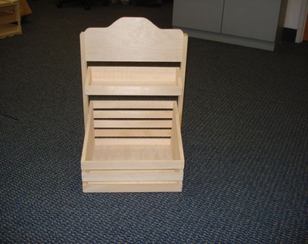 Unfinished custom wooden point-of-purchase (POP) display with two tiers, available in bulk for manufacturers.